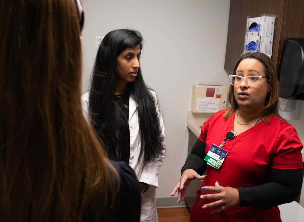 At The Wright Center for Community ʼһ Scranton Practice, Lida Kiefer, right, interprets conversations between clinicians such as Dr. Nirali Patel and patients with limited English proficiency, allowing the patients to better understand and advocate for their own care. The Honesdale resident is a certified ʼһ assistant II.